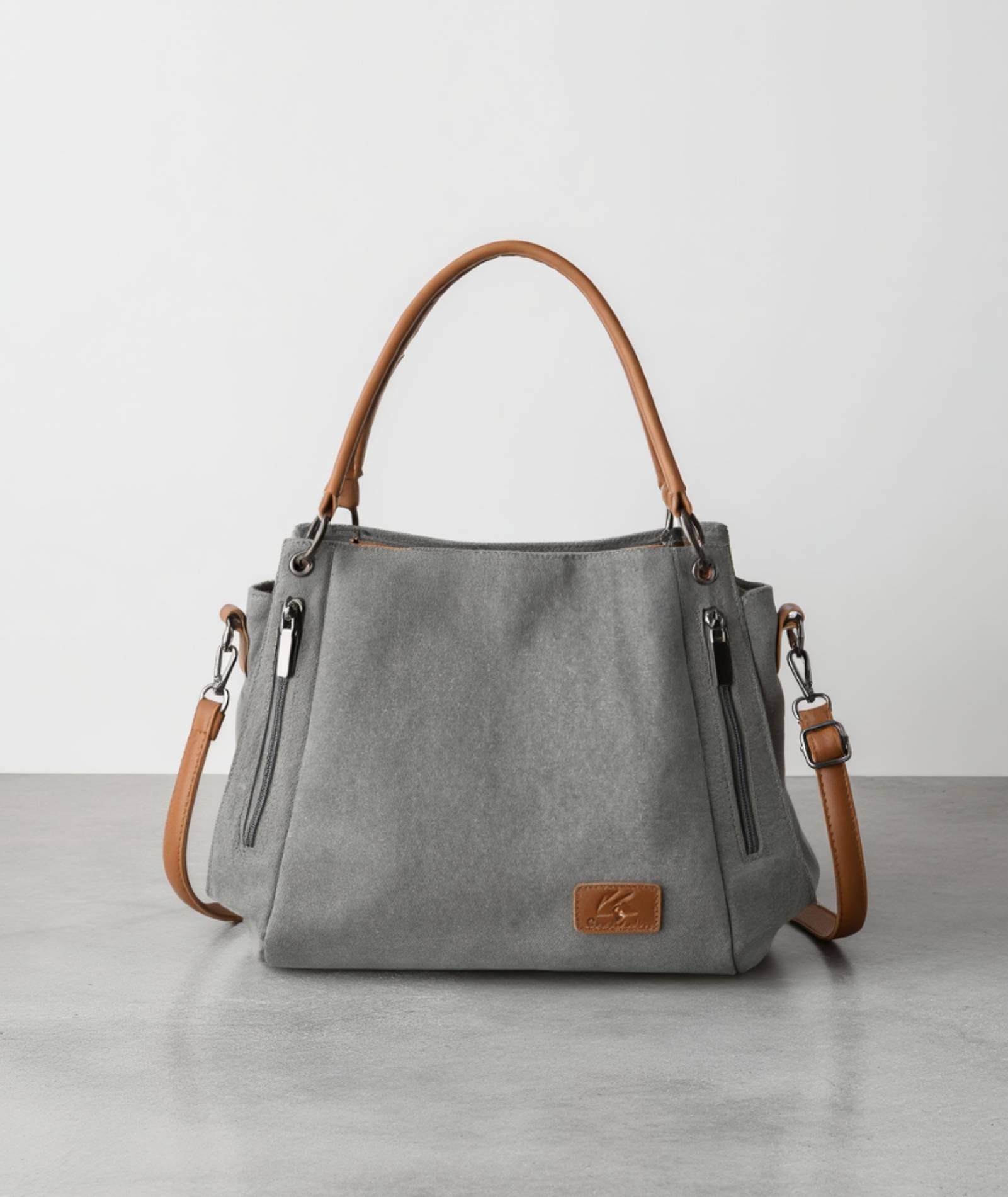 Bolsa feminina de lona com detalhes em couro - Karine