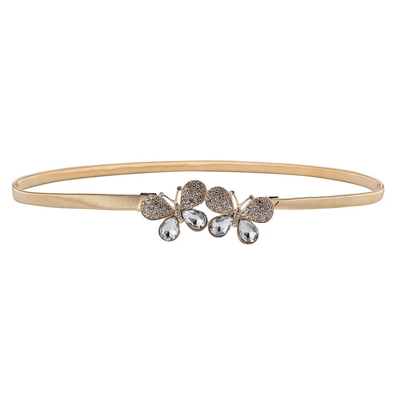 Cinto feminino dourado com fivela decorada em metal