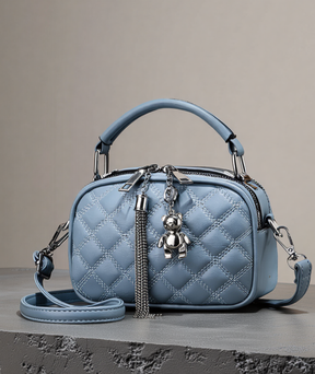 Bolsa feminina em couro ecológico com pingente - Meredith