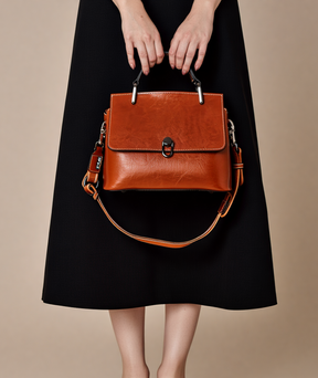 Bolsa feminina de mão e alça adicional de couro legitimo - Livia